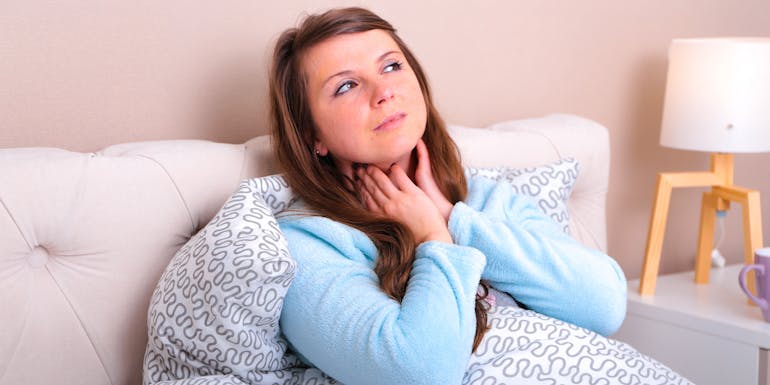 Woman with a sore throat